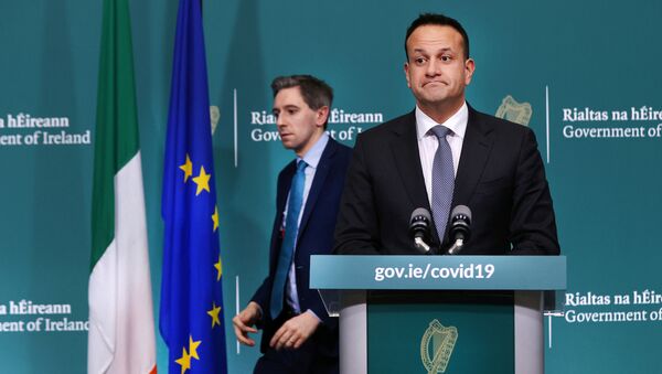 Ireland's Prime Minister Taoiseach Leo Varadkar and Health Minister Simon Harris attend a news conference on the ongoing situation with the coronavirus disease (COVID-19) at Government Buildings in Dublin, Ireland March 24, 2020. - Sputnik International