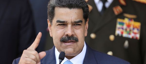Venezuela's President Nicolas Maduro speaks during a news conference at Miraflores Palace in Caracas, Venezuela, March 12, 2020. - Sputnik International