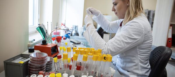 A laboratory worker is seen at Laboratory Diagnostic Department which performs diagnostic tests for coronavirus at Wielkopolska Center for Pulmonology and Thoracic Surgery in Poznan, Poland March 3, 2020. Picture taken March 3, 2020.  - Sputnik International