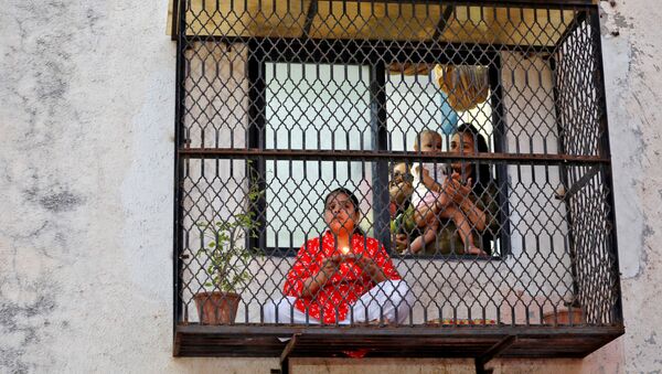 Hindu devotees pray for the eradication of coronavirus during Chaitra Navratri amid a nationwide lockdown to limit the spreading of the virus - Sputnik International