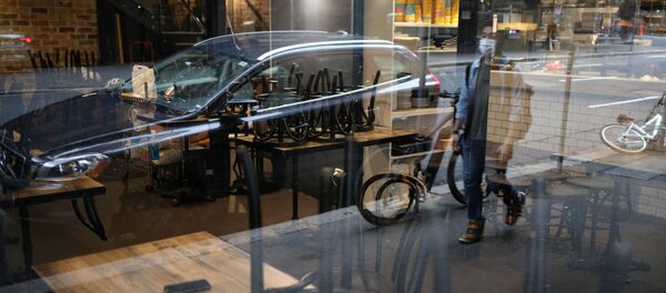 A man wearing a face mask is reflected in a closed restaurant after New South Wales began shutting down non-essential businesses and moving toward harsh penalties to enforce self-isolation as the spread of coronavirus disease (COVID-19) reached a critical stage in Sydney, Australia, March 24, 2020 A man wearing a face mask is reflected in a closed restaurant after New South Wales began shutting down non-essential businesses and moving toward harsh penalties to enforce self-isolation as the spread of coronavirus disease (COVID-19) reached a critical stage in Sydney, Australia, March 24, 2020 - Sputnik International