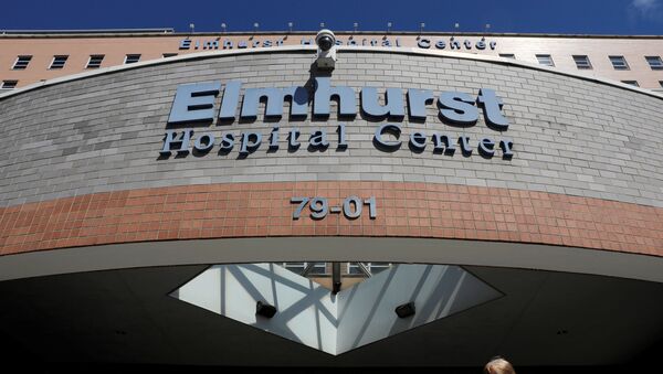 Signage is seen at the Elmhurst Hospital Center where testing and treatment for the coronavirus disease (COVID-19) is taking place in Queens, New York City, U.S., March 27, 2020 - Sputnik International