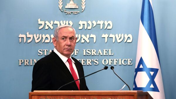 Israeli Prime Minister Benjamin Netanyahu delivers a speech at his Jerusalem office, regarding the new measures that will be taken to fight the coronavirus, March 14, 2020. - Sputnik International