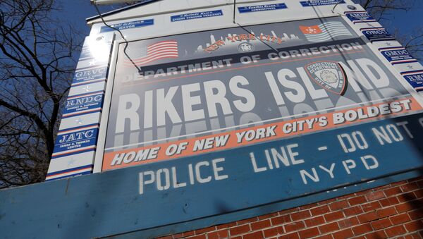 Signage is seen outside of Rikers Island, a prison facility, where multiple cases of the coronavirus disease (COVID-19) have been confirmed in Queens, New York City, U.S., March 22, 2020 - Sputnik International