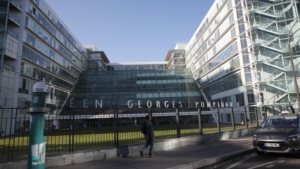 A man walks past the Georges-Pompidou hospital Tuesday, Sept. 10, 2019 in Paris. Seven-time Formula One world champion Michael Schumacher has been admitted under great secrecy to the Paris hospital to be treated Tuesday with a cutting-edge stem-cell therapy, according to a French newspaper.  - Sputnik International