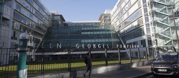 A man walks past the Georges-Pompidou hospital Tuesday, Sept. 10, 2019 in Paris. Seven-time Formula One world champion Michael Schumacher has been admitted under great secrecy to the Paris hospital to be treated Tuesday with a cutting-edge stem-cell therapy, according to a French newspaper. A man walks past the Georges-Pompidou hospital Tuesday, Sept. 10, 2019 in Paris. Seven-time Formula One world champion Michael Schumacher has been admitted under great secrecy to the Paris hospital to be treated Tuesday with a cutting-edge stem-cell therapy, according to a French newspaper. - Sputnik International