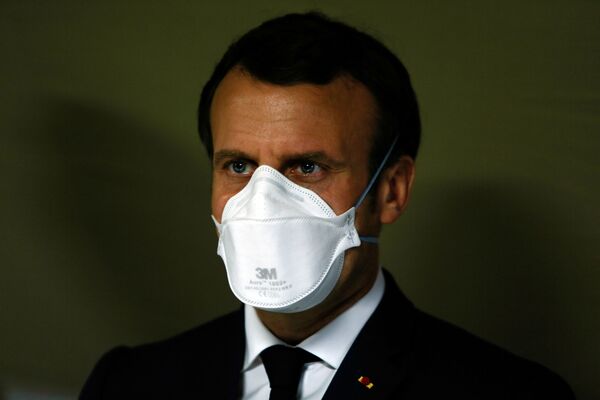 French President Emmanuel Macron wears a face mask during his visit to the military field hospital outside the Emile Muller Hospital in Mulhouse, eastern France March 25, 2020, during a strict lockdown in France to stop the spread of the coronavirus disease (COVID-19).   - Sputnik International