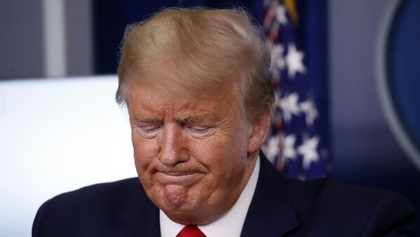 President Donald Trump pauses during a briefing about the coronavirus in the James Brady Press Briefing Room of the White House, Tuesday, March 31, 2020, in Washington - Sputnik International
