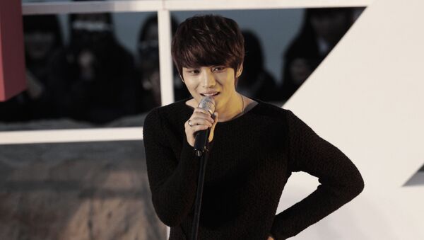 South Korean singer and actor Kim Jaejoong sings a song at the Open Talks to promote his movie Code Name: Jackal during the Busan International Film Festival in Busan, South Korea, Friday, Oct. 5, 2012. - Sputnik International