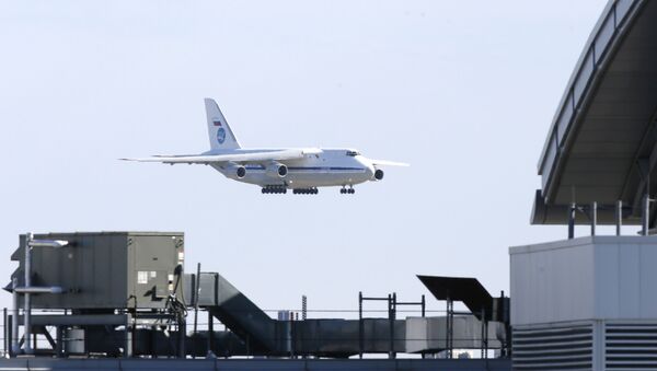 A Russian military transport plane carrying medical equipment, masks and supplies lands at JFK International Airport during the outbreak of the coronavirus disease (COVID-19) in New York City, New York, U.S., April 1, 2020 - Sputnik International
