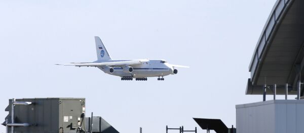 A Russian military transport plane carrying medical equipment, masks and supplies lands at JFK International Airport during the outbreak of the coronavirus disease (COVID-19) in New York City, New York, U.S., April 1, 2020 - Sputnik International