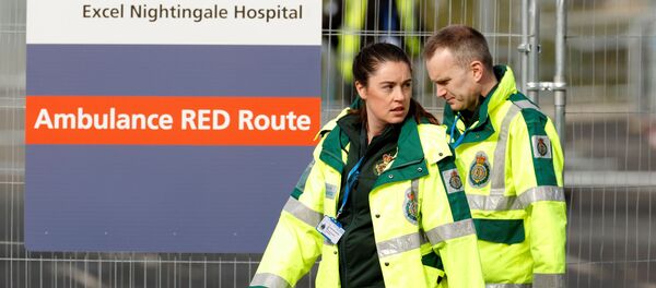 Medical staff outside NHS Nightingale hospital as the spread of the coronavirus disease (COVID-19) continues, London, Britain, April 2, 2020 Medical staff outside NHS Nightingale hospital as the spread of the coronavirus disease (COVID-19) continues, London, Britain, April 2, 2020 - Sputnik International