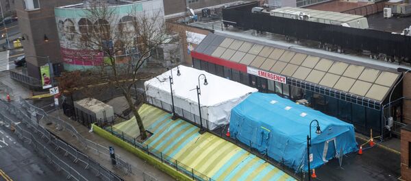 The tents used to test for COVID-19 at Elmhurst Hospital Center are seen, Sunday, March 29, 2020, in the Queens borough of New York - Sputnik International