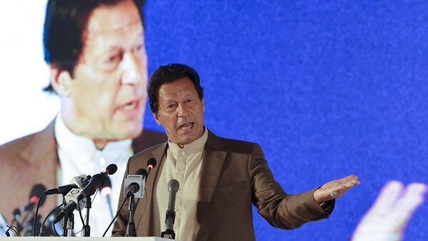 Pakistan's Prime Minister Imran Khan delivers a speech during the Refugee Summit Islamabad to mark 40 years of hosting Afghan refugees, in Islamabad on February 17, 2020.  - Sputnik International