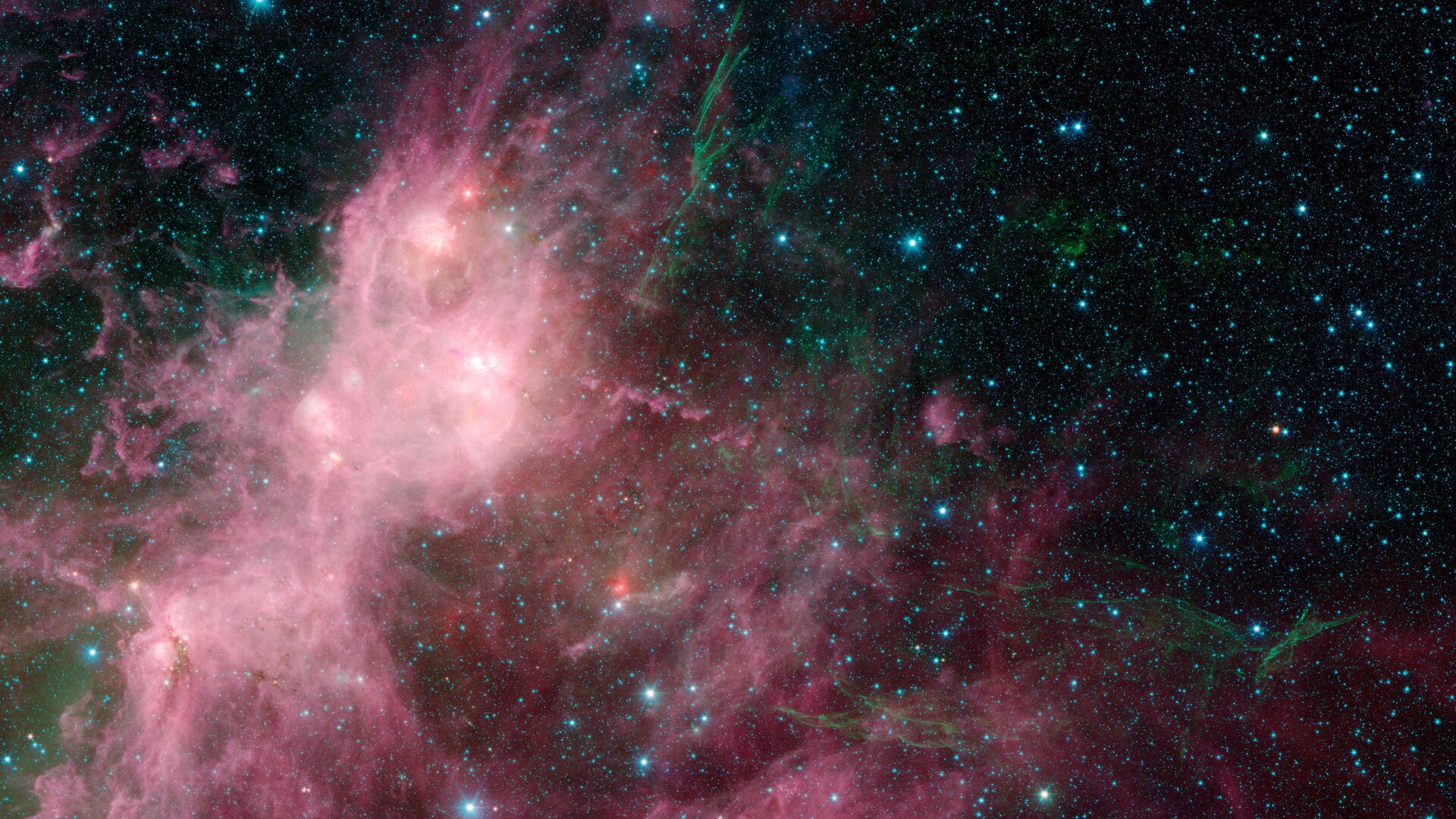 This image made available by NASA shows infrared data from the Spitzer Space Telescope and Wide-field Infrared Survey Explorer (WISE) in an area known as the W3 and W5 star-forming regions within the Milky Way Galaxy - Sputnik International, 1920, 13.01.2022