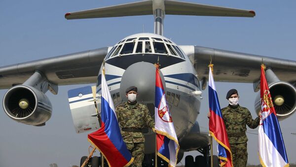Russian military transport plane with medical supplies on the tarmac at Batajnica military airport near Belgrade - Sputnik International