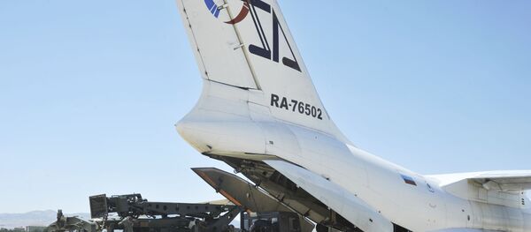 Military officials work around a Russian transport aircraft, carrying parts of the S-400 air defense systems, after it landed at Murted military airport outside Ankara, Turkey, Tuesday, Aug. 27, 2019. Military officials work around a Russian transport aircraft, carrying parts of the S-400 air defense systems, after it landed at Murted military airport outside Ankara, Turkey, Tuesday, Aug. 27, 2019. - Sputnik International