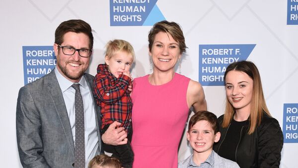 In this file photo David McKean, Maeve Kennedy Townsend Mckean and their children (son Gideon 2R) attend the Robert F. Kennedy Human Rights Hosts 2019 Ripple Of Hope Gala & Auction In NYC on December 12, 2019 in New York City. - Sputnik International