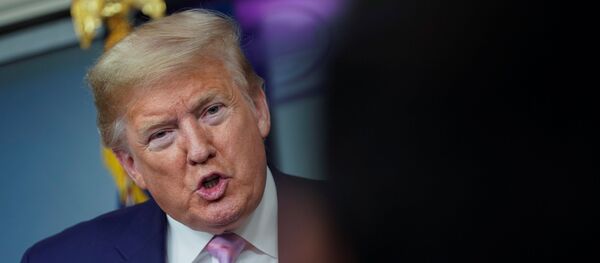 U.S. President Donald Trump answers a question during the daily coronavirus task force briefing at the White House in Washington, U.S., April 4, 2020 - Sputnik International