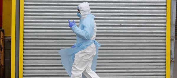 Healthcare worker outside Wyckoff Heights Medical Centre in the Brooklyn borough of NYC Healthcare worker outside Wyckoff Heights Medical Centre in the Brooklyn borough of NYC - Sputnik International
