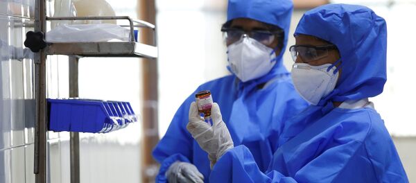 FILE PHOTO: Medical staff with protective clothing are seen inside a ward specialised in receiving any person who may have been infected with coronavirus, at the Rajiv Ghandhi Government General hospital in Chennai, India, January 29, 2020.  - Sputnik International