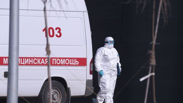 An ambulance near Russian hospital for coronavirus treatment in Kommunarka, Moscow. - Sputnik International