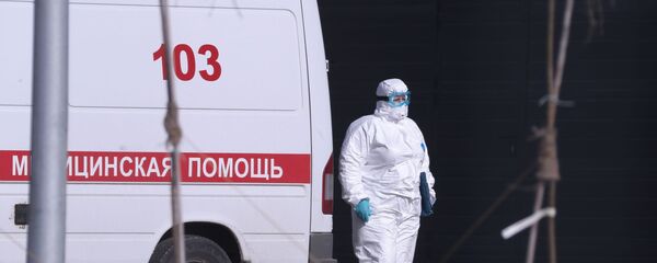 An ambulance near Russian hospital for coronavirus treatment in Kommunarka, Moscow. An ambulance near Russian hospital for coronavirus treatment in Kommunarka, Moscow. - Sputnik International