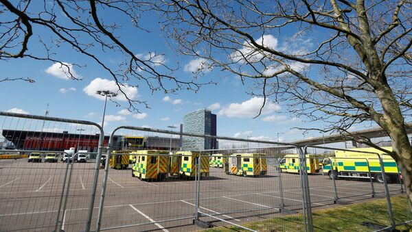 Ambulances are seen outside the NHS Nightingale Hospital at the Excel Centre, as the spread of the coronavirus disease (COVID-19) continues, London, Britain, April 4, 2020 - Sputnik International