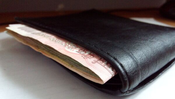 Black leather wallet with money - Sputnik International