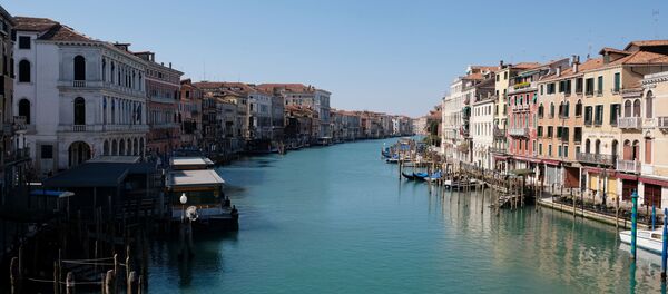 A view of an empty Grand Canal on Palm Sunday, following the coronavirus disease (COVID-19) outbreak in Venice, Italy, April 5, 2020 A view of an empty Grand Canal on Palm Sunday, following the coronavirus disease (COVID-19) outbreak in Venice, Italy, April 5, 2020 - Sputnik International