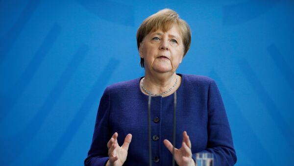 German Chancellor Angela Merkel talks about measures taken by the government to stop further spread of the coronavirus disease (COVID-19), during a briefing at the chancellery in Berlin, Germany April 6, 2020 - Sputnik International