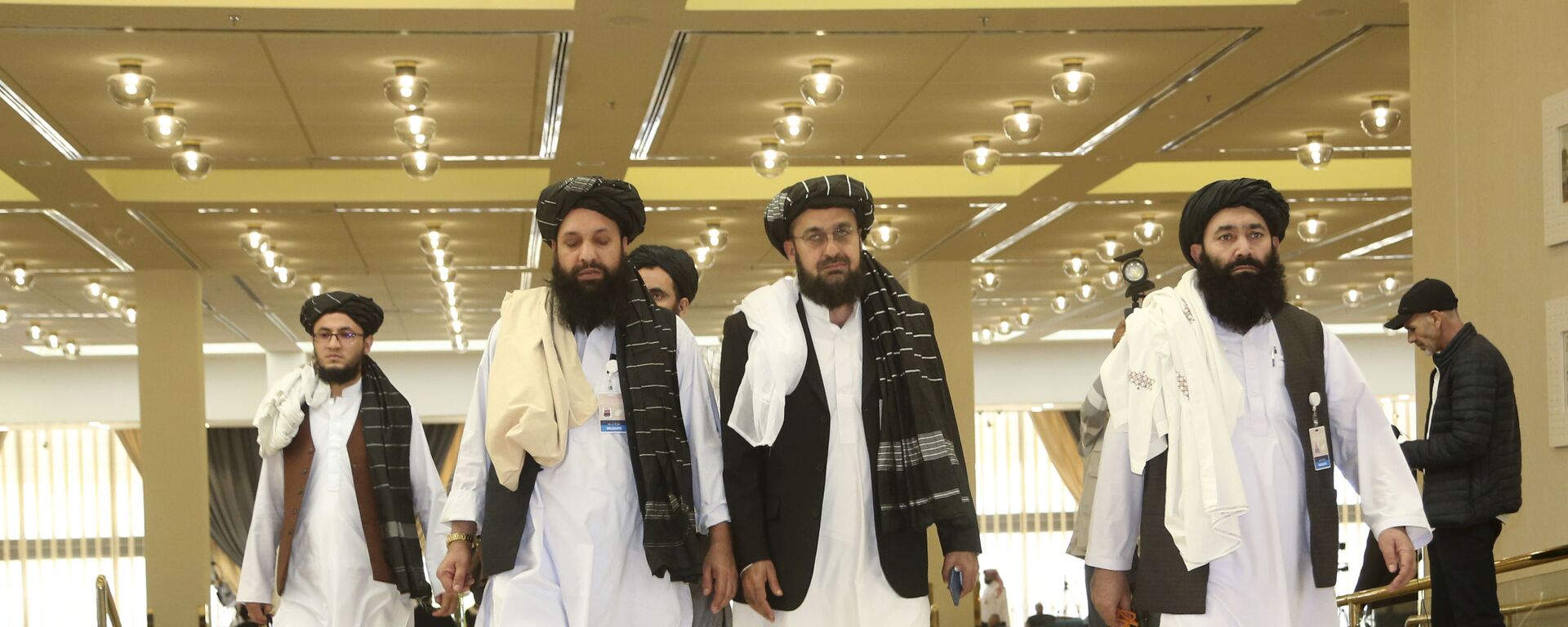 Afghanistan's Taliban delegation arrive for the agreement signing between Taliban and U.S. officials in Doha, Qatar, Saturday, Feb. 29, 2020. - Sputnik International, 1920, 14.08.2021