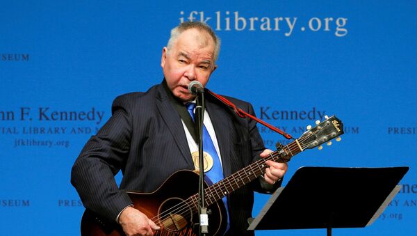 Musician John Prine performs after accepting his PEN New England Song Lyrics of Literary Excellence Award during a ceremony at the John F. Kennedy Library in Boston, Massachusetts, U.S. September 19, 2016. - Sputnik International
