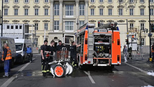 A fire truck is seen near the passageway on the ground floor of the new building of the Berlin City Palace after a fire broke out at the construction site in Berlin on April 8, 2020 - Sputnik International