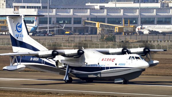 In this Dec. 24, 2017, photo released by Xinhua News Agency, China's AG600, the world's largest amphibious aircraft, also known as Kunlong performs its maiden flight in Zhuhai, south China's Guangdong Province. A Chinese media report says the newly developed sea plane that could expand the military's room to operate in the South China Sea has passed a series of on-water tests. - Sputnik International