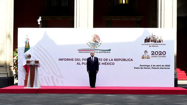Mexico's President Andres Manuel Lopez Obrador sings the national anthem before the presentation of a plan to lift the economy out of the coronavirus crisis, at the National Palace in Mexico City, Mexico April 5, 2020 - Sputnik International