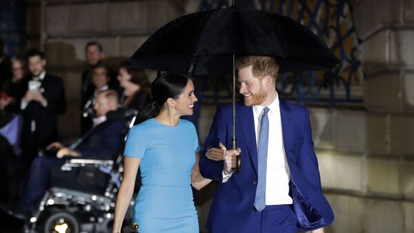 In this Thursday, March 5, 2020 file photo, Britain's Prince Harry and Meghan, the Duke and Duchess of Sussex arrive at the annual Endeavour Fund Awards in London. Prince Harry and his wife Meghan are ending their lives as senior members of Britain’s royal family and starting an uncertain new chapter as international celebrities and charity patrons. In January the couple shocked Britain by announcing that they would step down from official duties, give up public funding, seek financial independence and swap the U.K. for North America. - Sputnik International