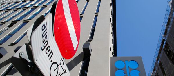 The logo of the Organization of the Petroleoum Exporting Countries (OPEC) and a traffic sign are seen outside of OPEC's headquarters in Vienna, Austria April 9, 2020 - Sputnik International