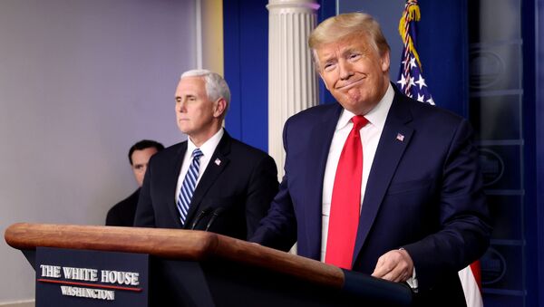 US President Donald Trump arrives with Vice President Mike Pence to lead the daily coronavirus task force briefing at the White House in Washington, US, 9 April 2020 - Sputnik International
