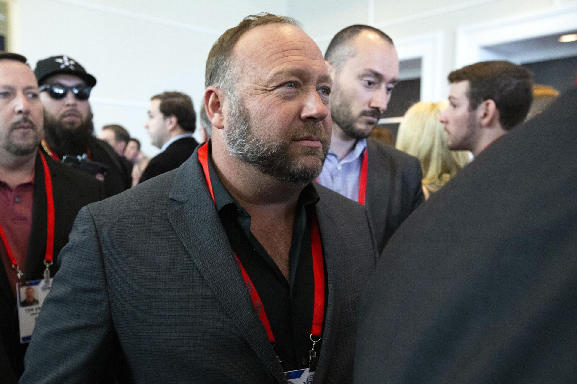 Conspiracy theorist Alex Jones walks at the Conservative Political Action Conference, CPAC 2020, at the National Harbor, in Oxon Hill, Md., Thursday, Feb. 27, 2020 - Sputnik International, 1920, 22.12.2021