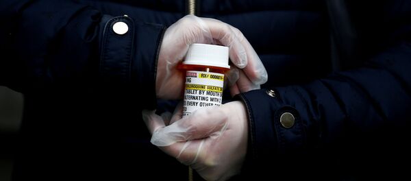  Laura Ng, who has lupus and had to recently call at least five pharmacies before she could find a place to fill her hydroxychloroquine prescription, is photographed in Seattle, Washington, U.S. March 31, 2020.  - Sputnik International