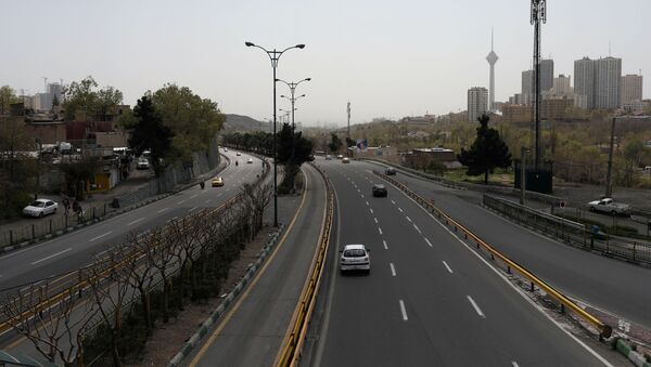 Cars are rare on the highway, amid fear of the coronavirus disease (COVID-19), in Tehran, Iran, 2 April 2020.  - Sputnik International