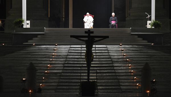 A photo taken and handout on April 10, 2020 by the Vatican Media shows Pope Francis presiding over Good Friday's Way of the Cross (Via Crucis) at St. Peter's Square in The Vatican on April 10, 2020, during the lockdown aimed at curbing the spread of the COVID-19 infection, caused by the novel coronavirus. - Sputnik International