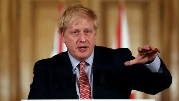 British Prime Minister Boris Johnson holds a news conference addressing the government's response to the coronavirus outbreak, at Downing Street in London, Britain March 12, 2020. - Sputnik International