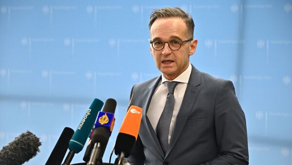 German Foreign Minister Heiko Maas addresses the media at the Foreign Ministry in Berlin on March 17, 2020, to comment on the situation concerning the spread of the novel coronavirus. - Sputnik International