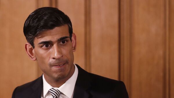 In this file photo dated Tuesday, March 17, 2020, Britain's Chancellor Rishi Sunak gives a press conference about the ongoing situation with the COVID-19 coronavirus outbreak inside 10 Downing Street in London. - Sputnik International
