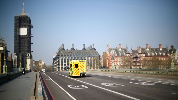 An ambulance is seen on Westminster bridge as the spread of the coronavirus disease (COVID-19) continues, in London, Britain April 9, 2020 - Sputnik International