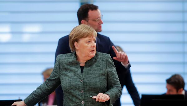 German Chancellor Angela Merkel and Health Minister Jens Spahn arrive for the weekly cabinet meeting, as the spread of the coronavirus disease (COVID-19) continues, in Berlin, Germany April 8, 2020 - Sputnik International
