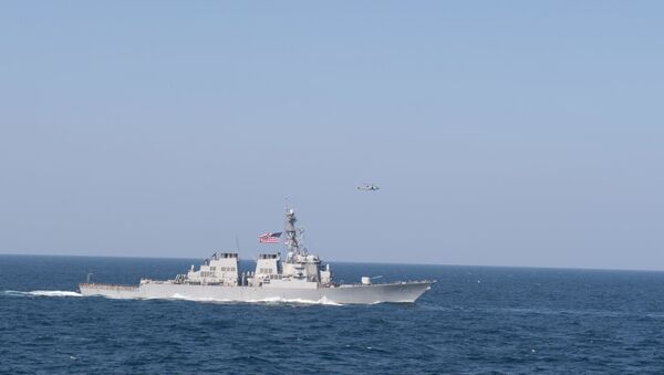 The guided-missile destroyer USS Decatur (DDG 73) sails in formation in the Arabian Sea, Dec. 14, 2018. The John C. Stennis Carrier Strike Group, Essex Amphibious Ready Group, and 13th Marine Expeditionary Unit are conducting integrated operations in the Arabian Sea to ensure stability and security in the Central Region, connecting the Mediterranean and the Pacific through the western Indian Ocean and three strategic choke points. - Sputnik International