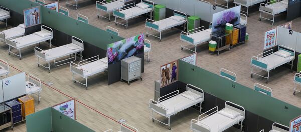 A view of beds at a shopping mall, one of Iran's largest, which has been turned into a centre to receive patients suffering from the coronavirus disease (COVID-19), in Tehran, Iran, April 4, 2020 - Sputnik International